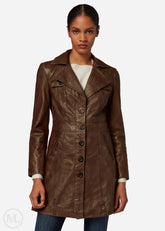 Woman wearing a dark brown leather coat on a white background